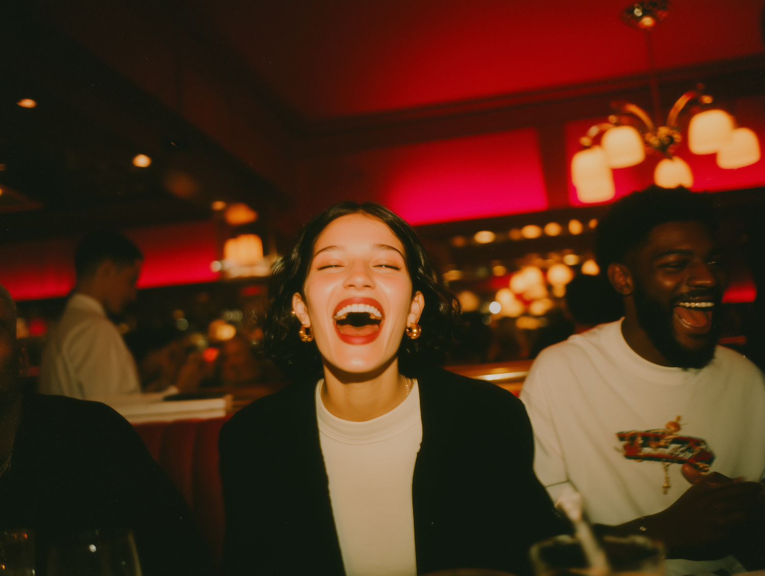 A diverse group of remote team members laughing and interacting during a virtual team-building activity, feeling connected.