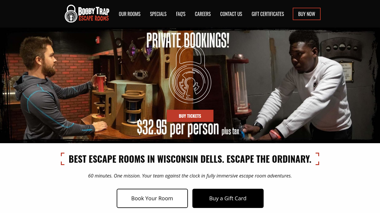 Screenshot of the Booby Trap Escape Rooms homepage, showcasing their immersive themes and booking options for teams.