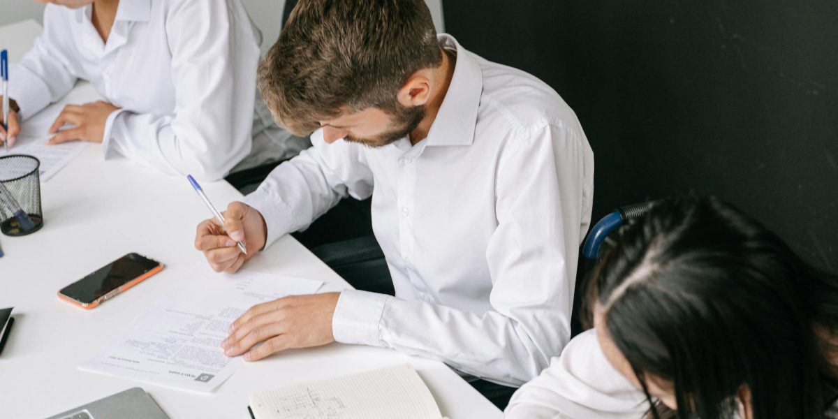 A diverse team actively collaborating, demonstrating effective communication and problem-solving.